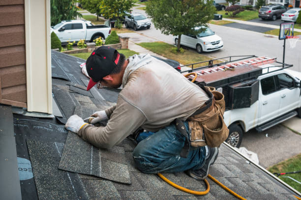 Professional Storm Damage Roof Repair technician working in Center Point, TX